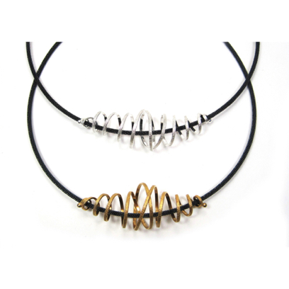 Grand Coil Neckring - Mixed 

Oxidized Sterling & 22K Gold vermeil 
NKSP04-G-OX
NKSP04-S-OX
